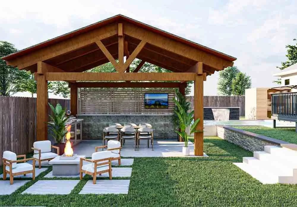 A large wooden pavilion covers an outdoor kitchen and dining area, next to a separate seating arrangement with a fire pit