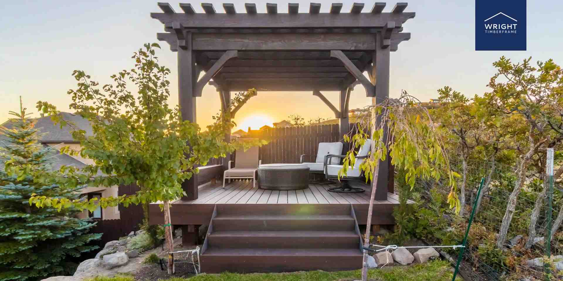 Pergola Buying Guide for Outdoor Living Spaces Timberframe pergola on a raised deck at sunset, shown as an example in a pergola buying guide covering design, materials, and placement.