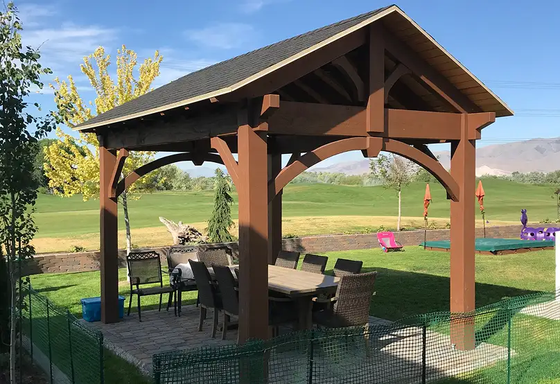 Custom timber frame pavilion design for outdoor living space in Murray, Utah.