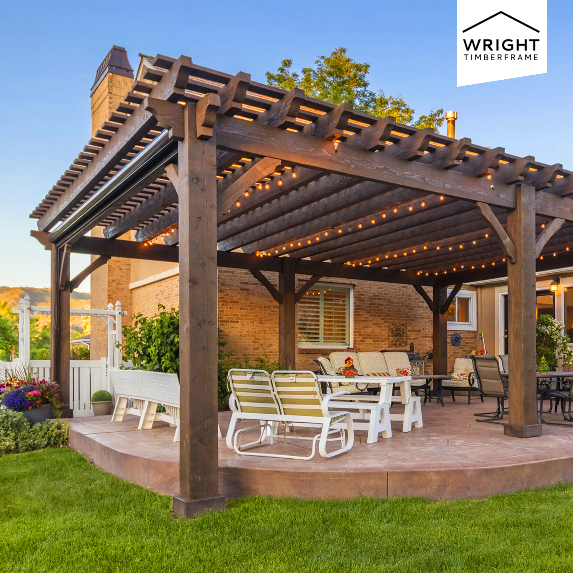 Can you add electrical, fans, or lighting to a pergola? Timber pergola with built-in string lights over a backyard patio.